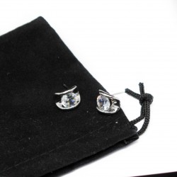 Men’s or women’s silver studs with a white gem