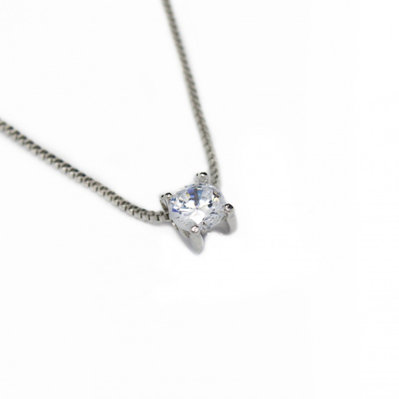 Women’s white gold necklace with claw shaped pendant