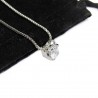 Women’s white gold necklace with claw shaped pendant